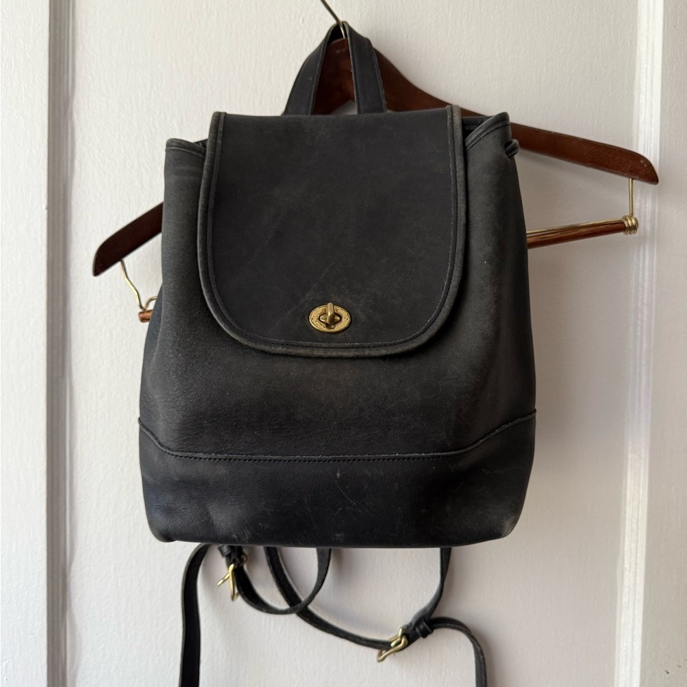 Vintage Coach Daypack Black leather with original coach tag and brass hardware.